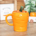 Something Different Enamel Mugs - Carrot Shaped Mug and Socks Set